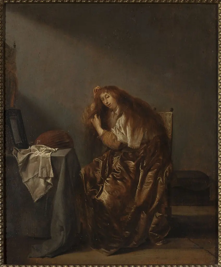 Woman in front of the mirror, by Pieter Codde