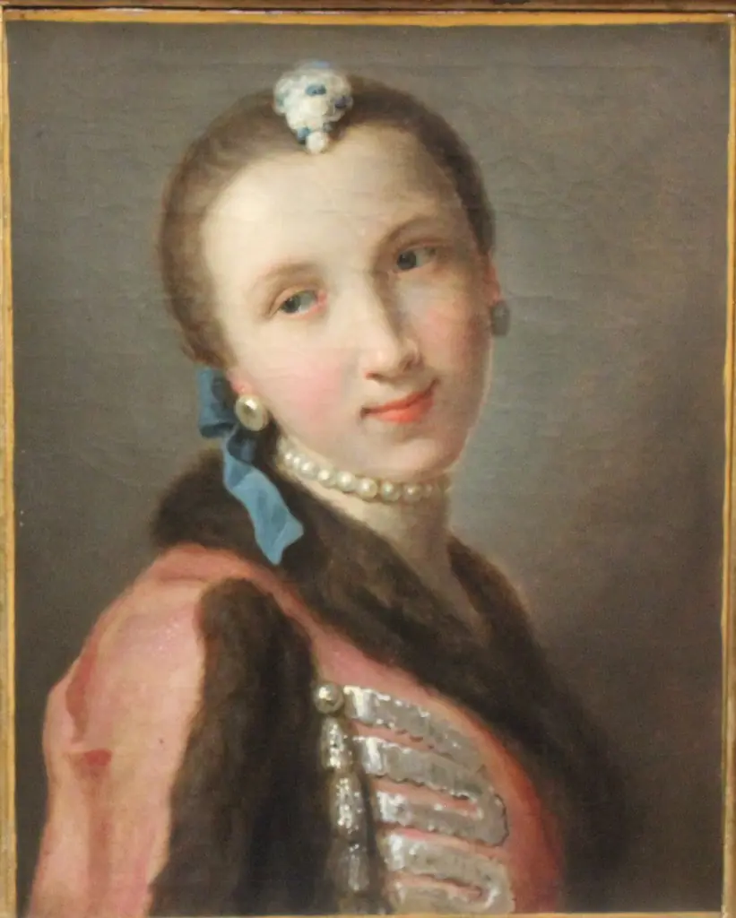 Smiling girl with pearl necklace, by Pietro Rotari