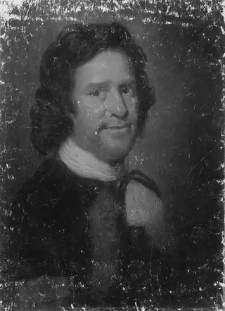 Portrait of a Man in a Black Suit