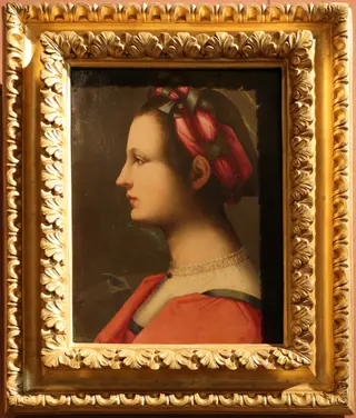 Portrait of a young woman as Saint Catherine of Alexandria