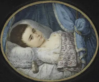 Portret van een ziek meisje in bed liggend