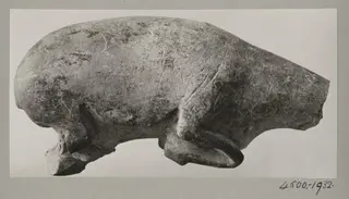 Prehistoric limestone sculpture of a deer, torso