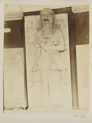Relief showing Gilgamesh suffocating the lion from Palace of Khorsabad, period of Sargon II (722-795 B.C.)