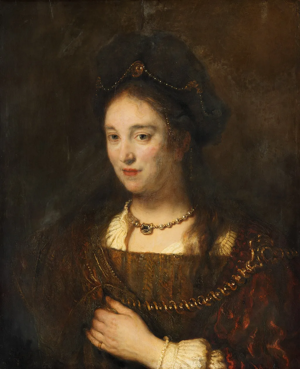 Half-figure of a woman with a beret, by Rembrandt, oil, 1643