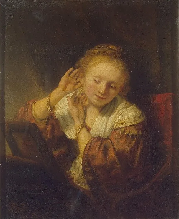 Young woman with earrings, by Rembrandt, oil, 1638