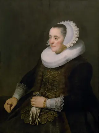 Portrait of a Woman holding Gloves, by Rembrandt van Rijn