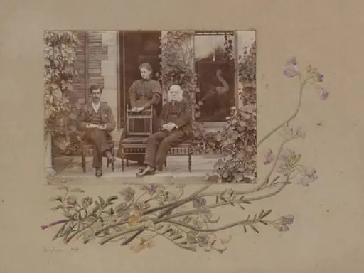 Photograph of Bertram, Beatrix and Rupert Potter with partial border design of yellow and purple flowers, by Rupert Potter