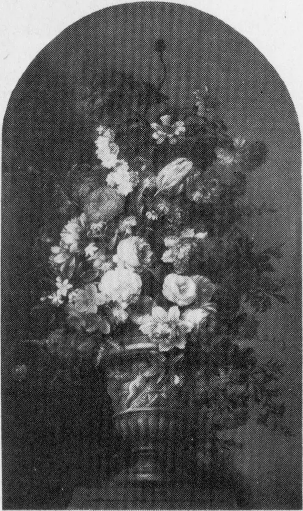 Schoorsteenstuk met bloemen in een vaas