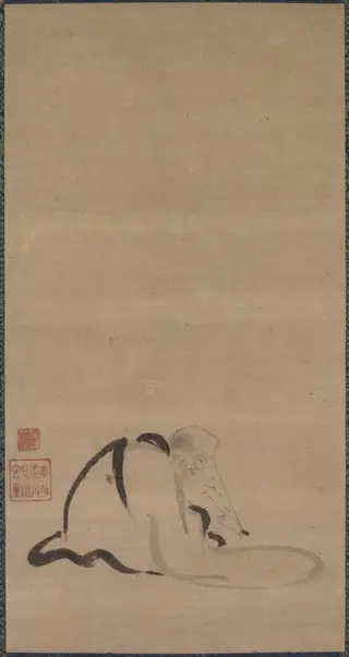 Seated Priest
