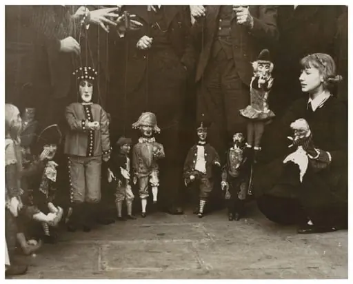 Photograph of puppeteers at the opening of the 13th Exhibition of the British Puppet and Model Theatre Guild, 1938, by Sport & General Press Agency Ltd