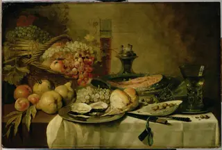 Still life with berkemeyers, salmon, fruit and oysters on a laid table