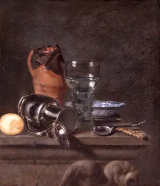 Still life with fallen pewter jug and roemer