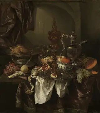 Still life with fruit, roast, silver- and glassware, porcelain and columbine cup on a dark tablecloth with white serviette, by Abraham van Beijeren