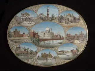 The Taj Mahal, Agra, in a gilt frame surrounded by eight smaller views.