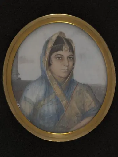 A lady in a blue, gold-edged sari., by Unknown