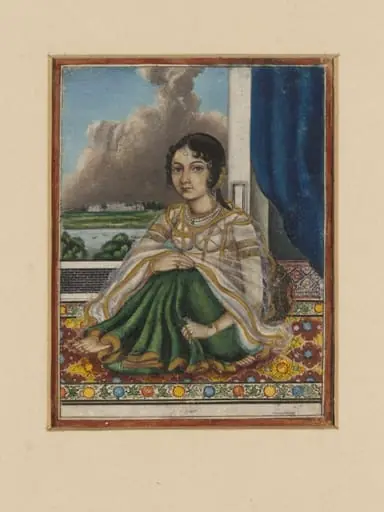 An Indian lady seated on a carpet by an open door overlooking a river with a European-style house on the opposite bank., by Unknown