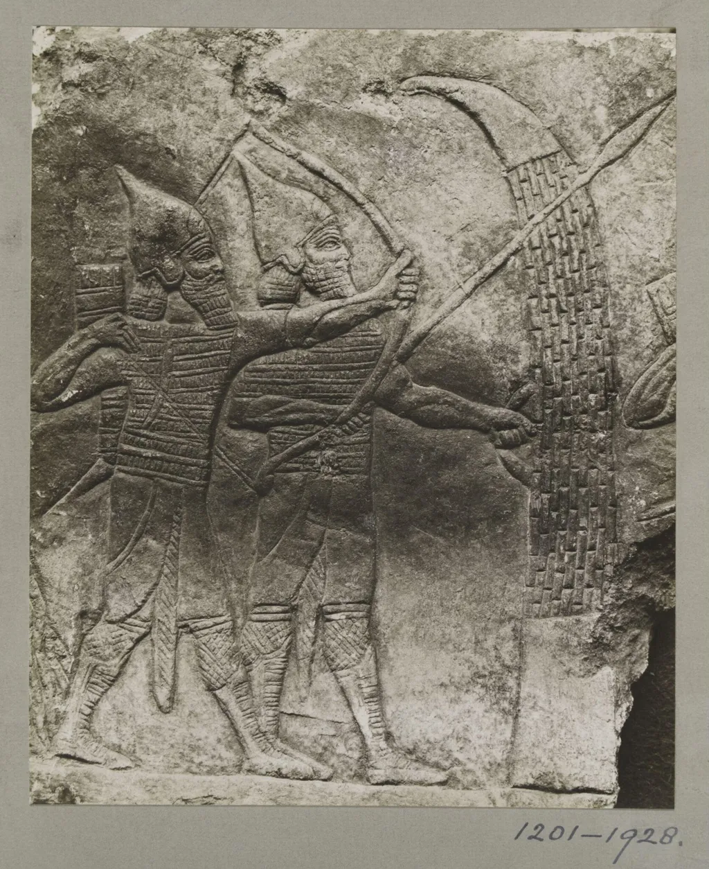 Assyrian slab of archers and spearmen, from the Palace of Shur-Bari-Pal (BC. 668-626), at Nineveh. ca. 660 B.C., by Unknown, photographic, 1928