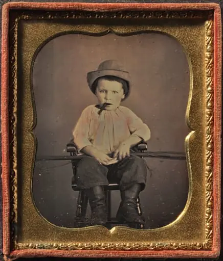 Boy with Cigar, by Unknown