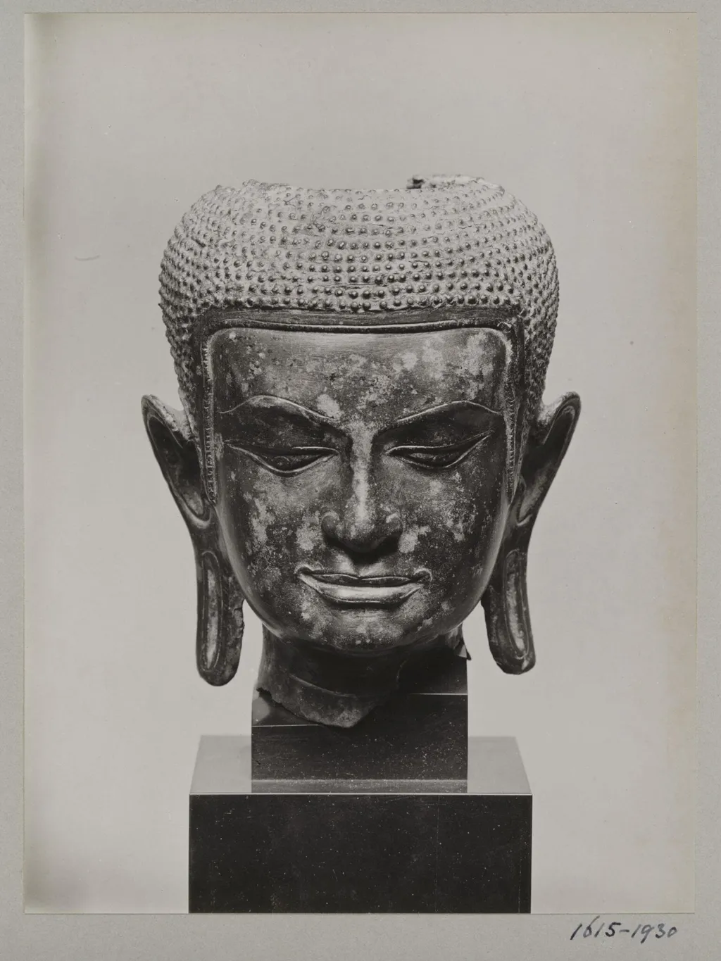 Cambodian bronze sculpture of Buddha head, ca. 13th century A.D., V&A Museum, by Unknown, photographic, 1924