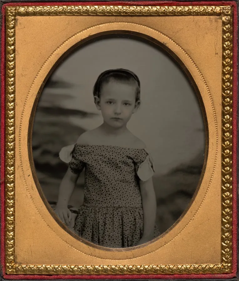 Child in off-shoulder polka dot dress, by Unknown, 1862