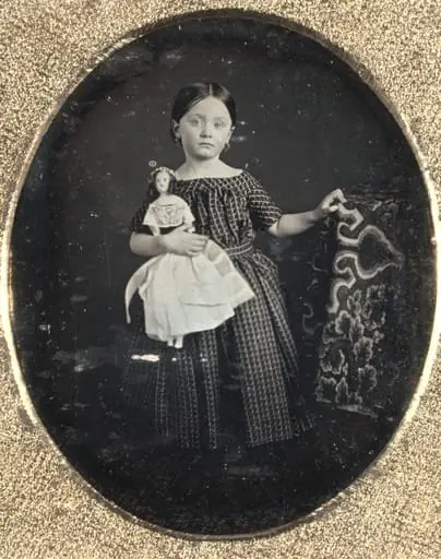 Girl with Doll, by Unknown