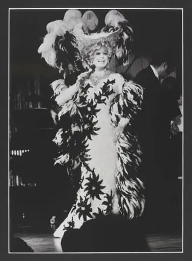 Photograph of Danny La Rue as Mae West, by Unknown