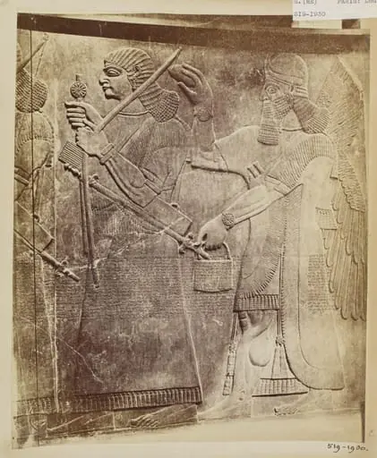 Sculpture depicting a royal Assyrian armsbearer with attendant genius from the period of Ashur-nasir-pal II (885-860 B.C.), Louvre, Paris, by Unknown