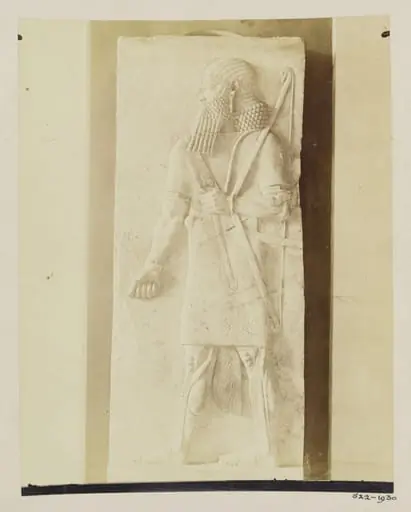 Sculpture of Assyrian archer, 9th century B.C., Louvre, Paris, by Unknown