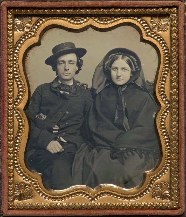 Seated couple in mourning attire, by Unknown, 1857