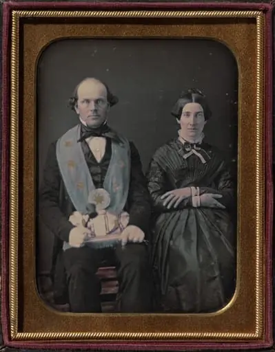 Seated Masonic lodge master and wife, by Unknown