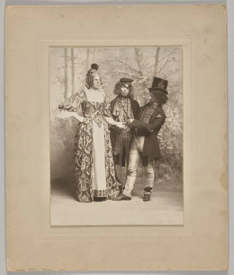 Untitled (theatrical scene with 3 figures: the palm reader), by Unknown, 1884