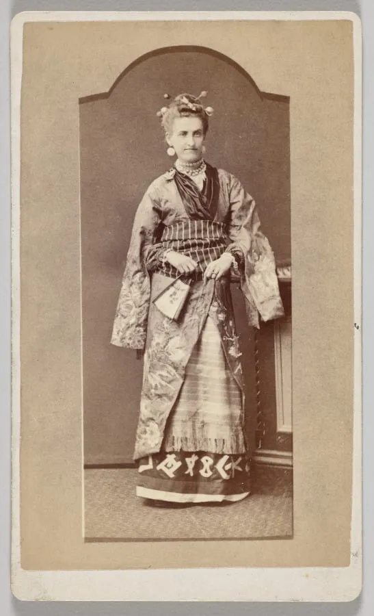 Untitled (white woman in Japanese kimono with fan), by Unknown, 1894
