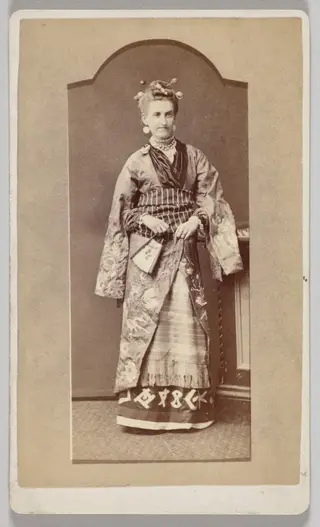 Untitled (white woman in Japanese kimono with fan)