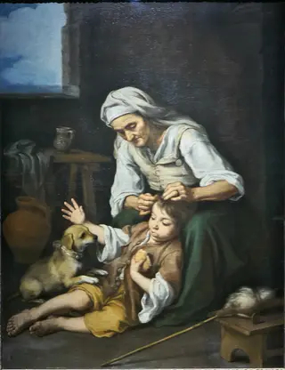 Vieja despiojando a un niño