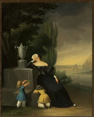 Widow with a child at her husband's grave