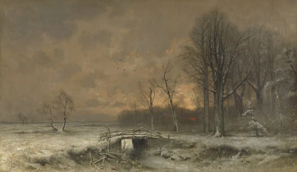 Winter Scene with the Sun Setting Behind Trees