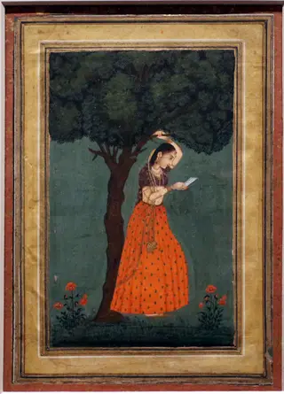 Woman Grasping Tree Branch
