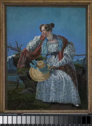 Young Woman Sitting in a Norwegian Landscape